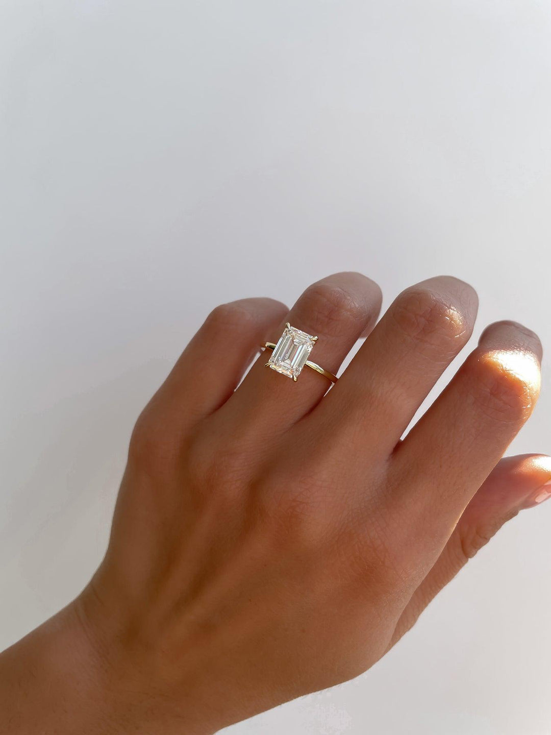 a woman's hand with a ring on it