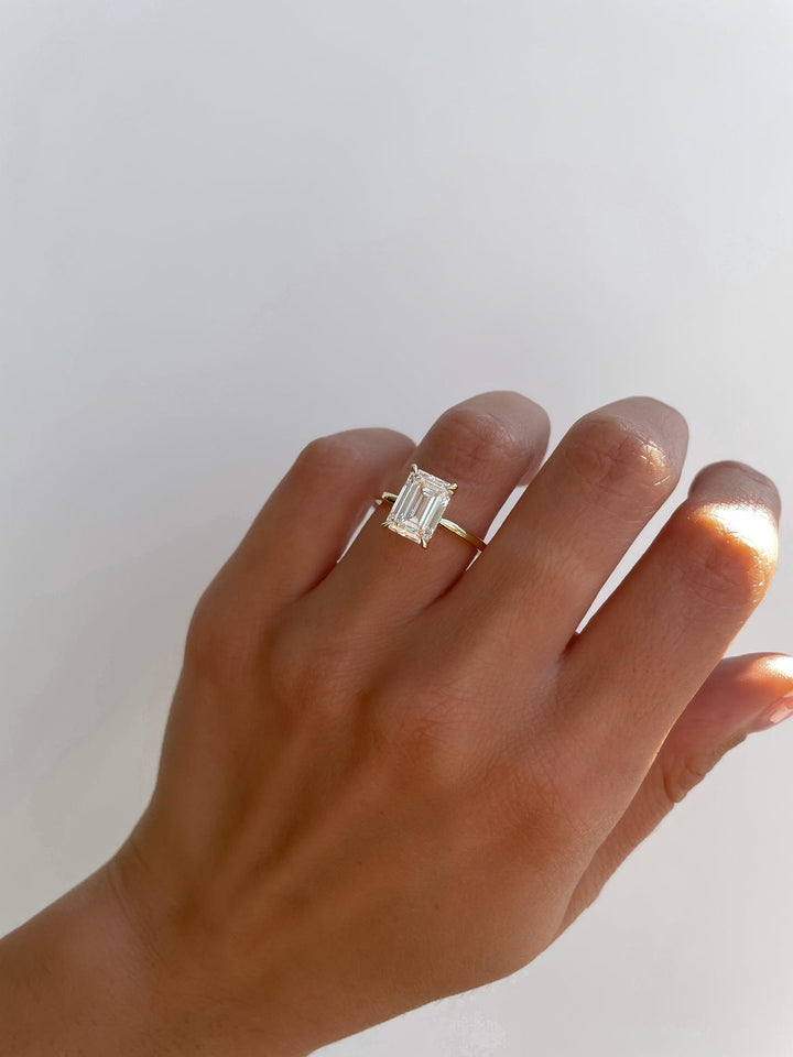a woman's hand with a ring on it