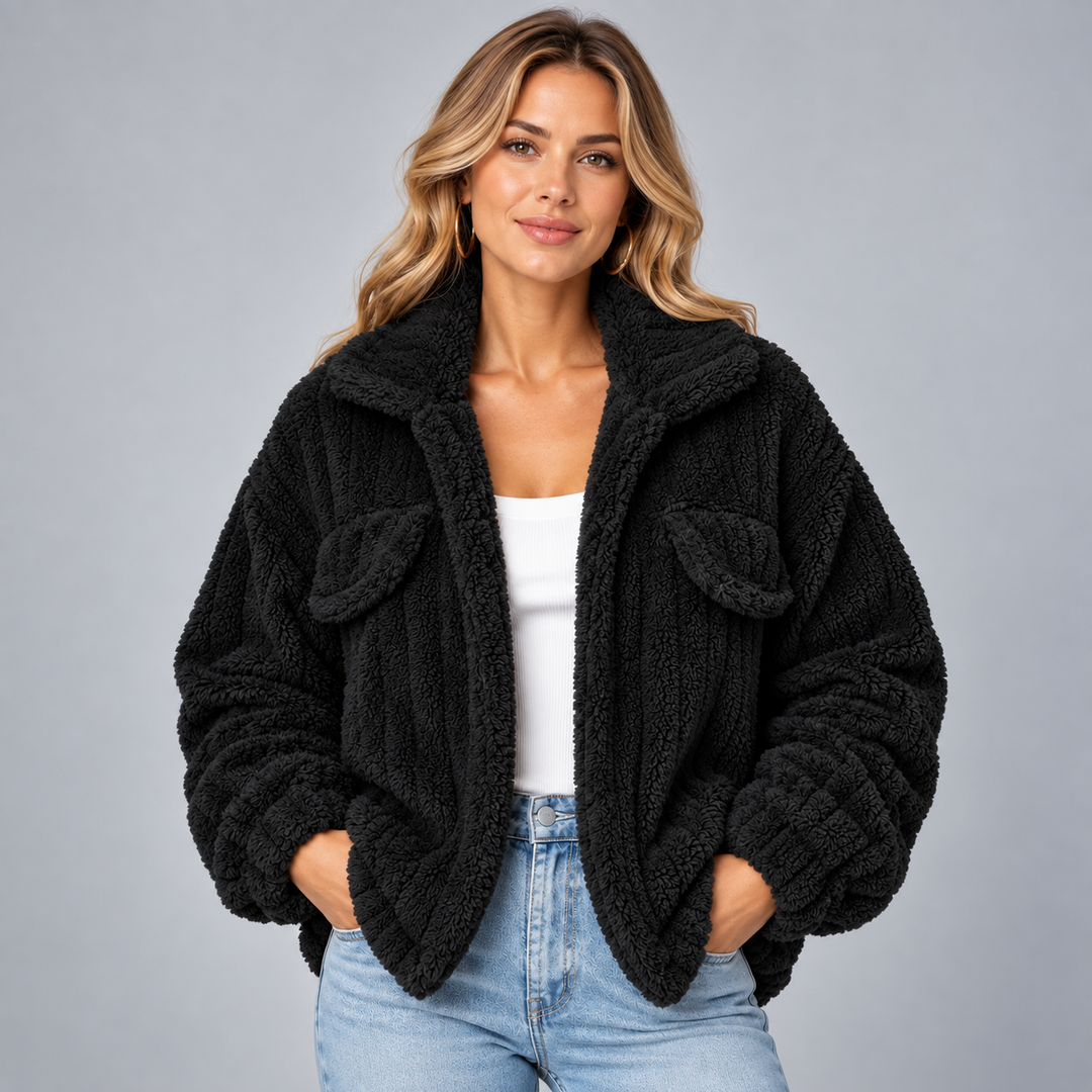 Dame teddyjakke med oversized pasform og brystlommer