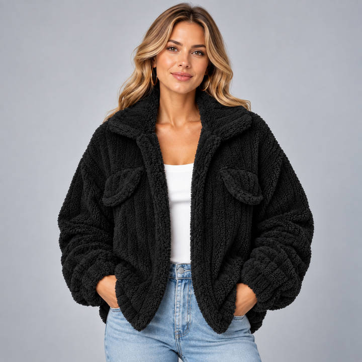 Dame teddyjakke med oversized pasform og brystlommer