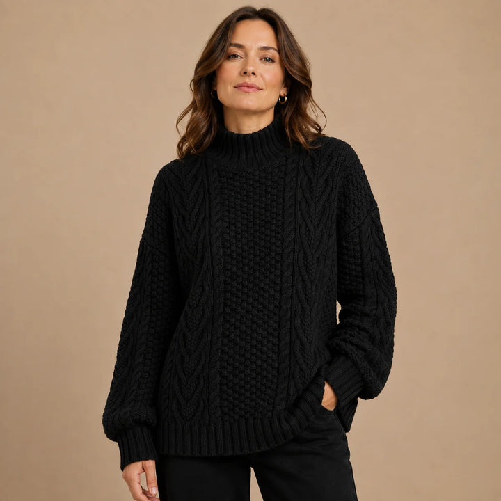 Dame sweater med rullekrave og grov snoet strik