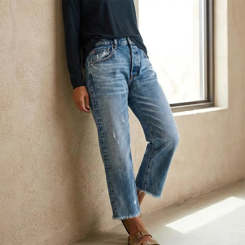 Retro jeans dame i lys denimvask med flossede kanter