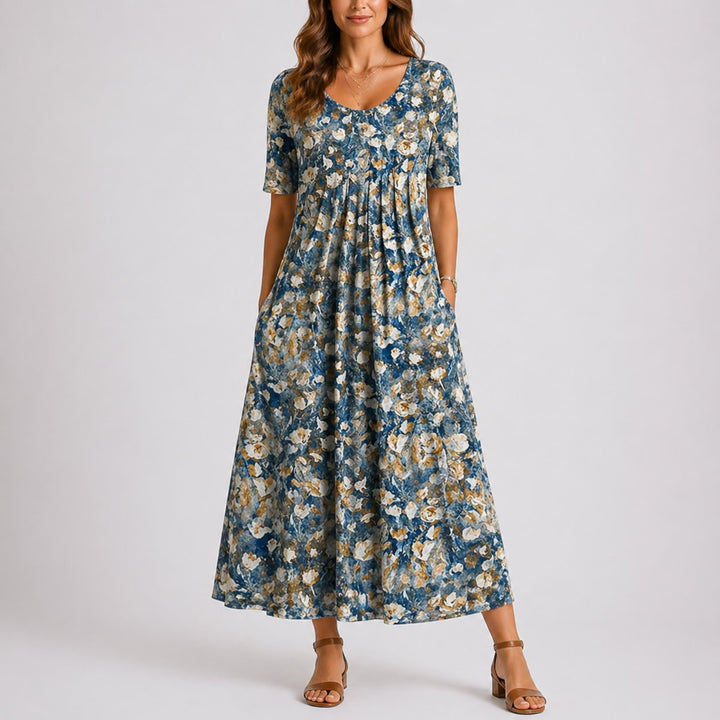 Halvlang kjole dame med blå og beige blomsterprint og lommer