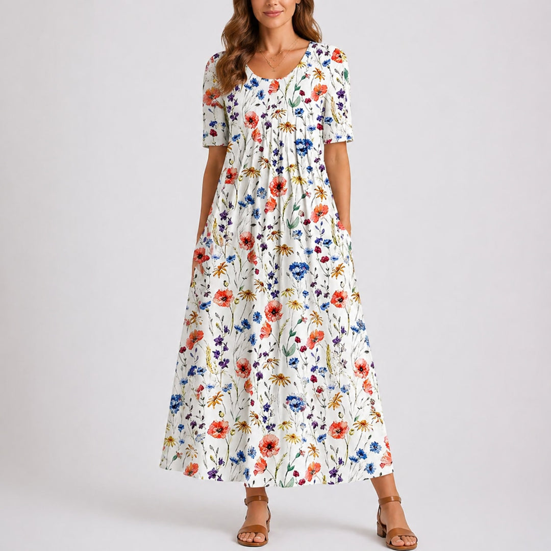 Hvid halvlang sommerkjole dame med farverigt blomsterprint
