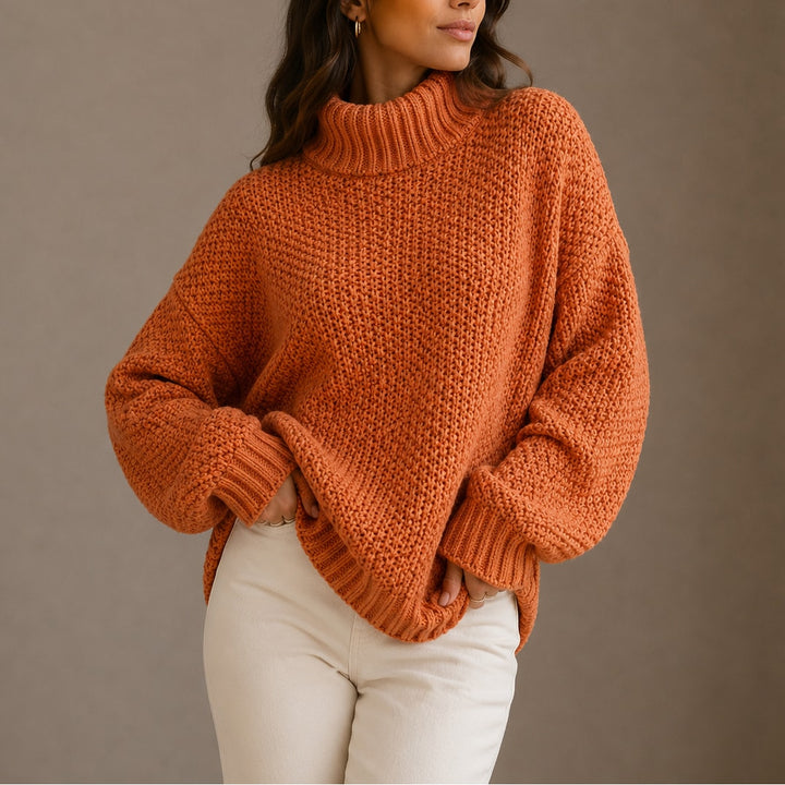 Orange oversized striktrøje dame med rullekrave i grov strik