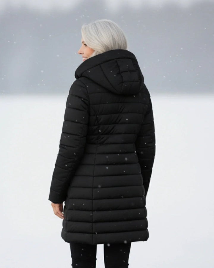 Quiltet vinterjakke dame med hætte og sherpafor