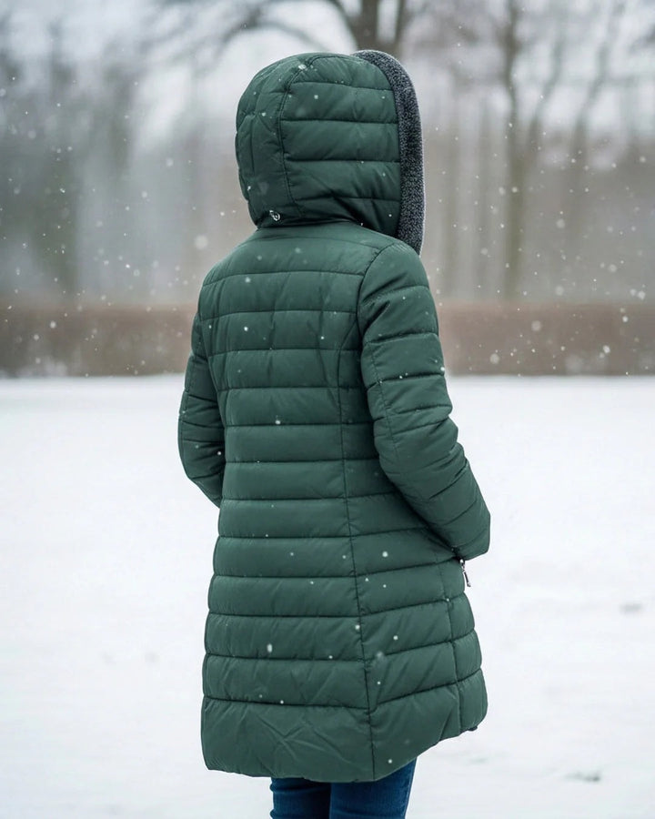 Quiltet vinterjakke dame med hætte og sherpafor