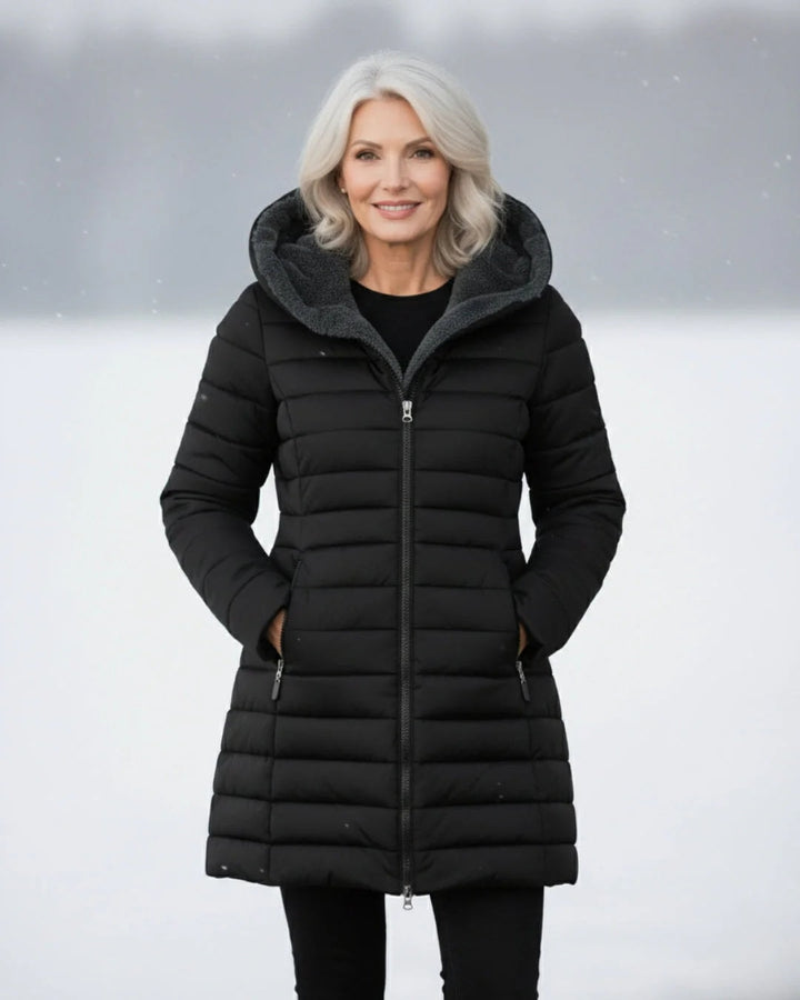 Quiltet vinterjakke dame med hætte og sherpafor