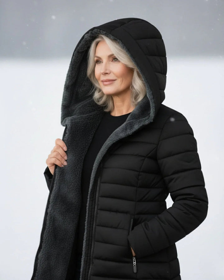 Quiltet vinterjakke dame med hætte og sherpafor