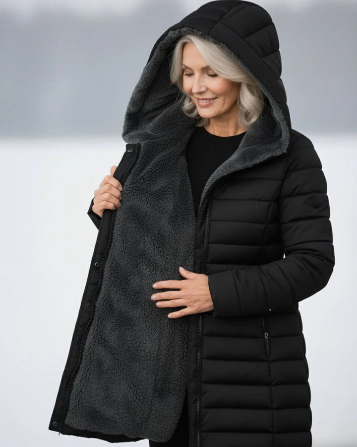 Quiltet vinterjakke dame med hætte og sherpafor